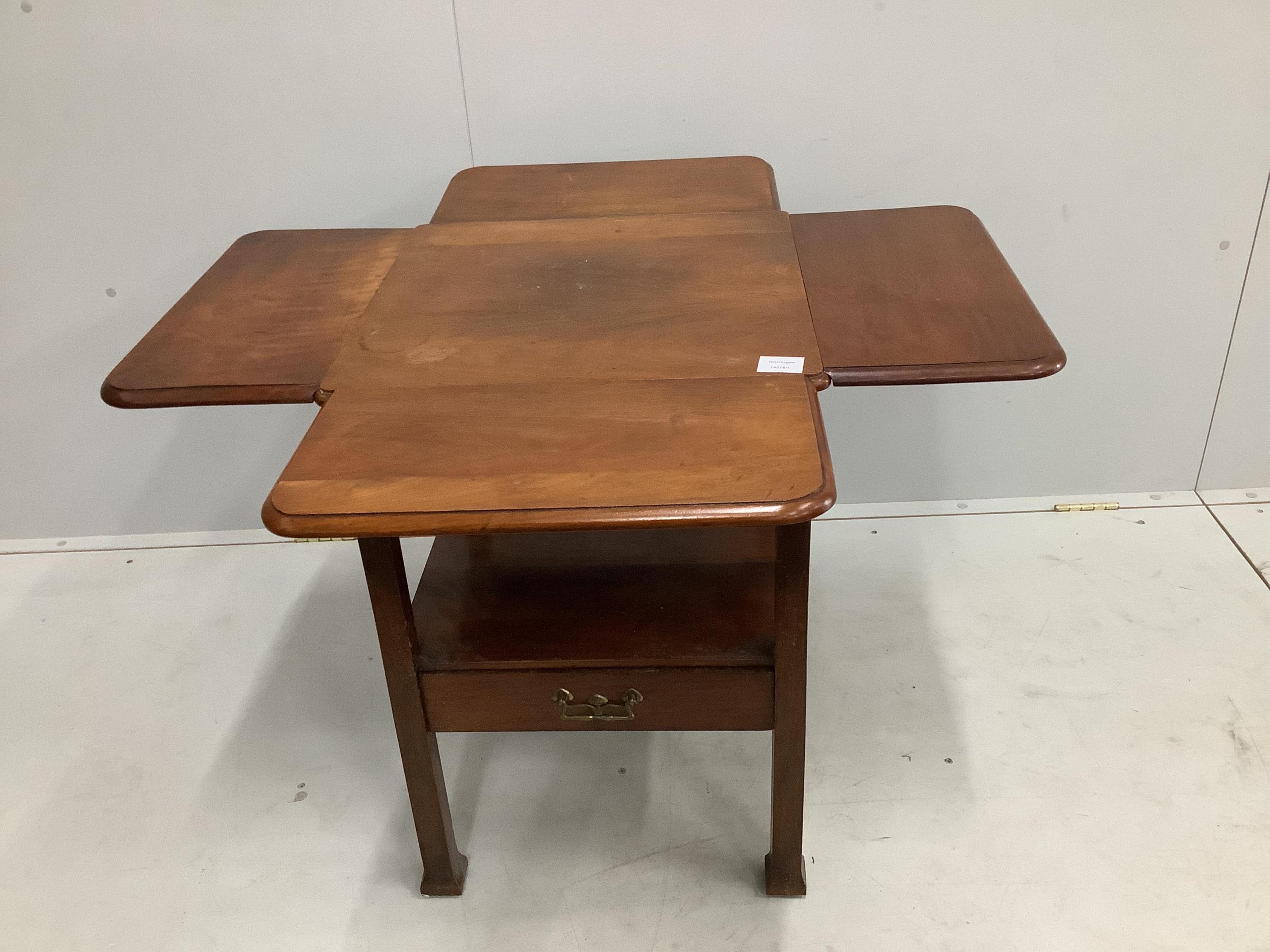 A late Victorian mahogany drop flap occasional table, width 89cm extended, height 69cm. Condition - fair